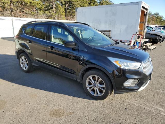 Photo 4 from auction – 2017 FORD ESCAPE SE with VIN 1FMCU9GD6HUB55540