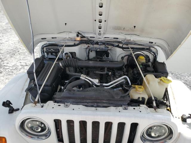 Photo 11 from auction – 2000 JEEP WRANGLER / with VIN 1J4FA59S8YP703545