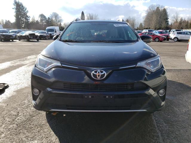Photo 5 from auction – 2016 TOYOTA RAV4 XLE with VIN 2T3RFREV6GW476967