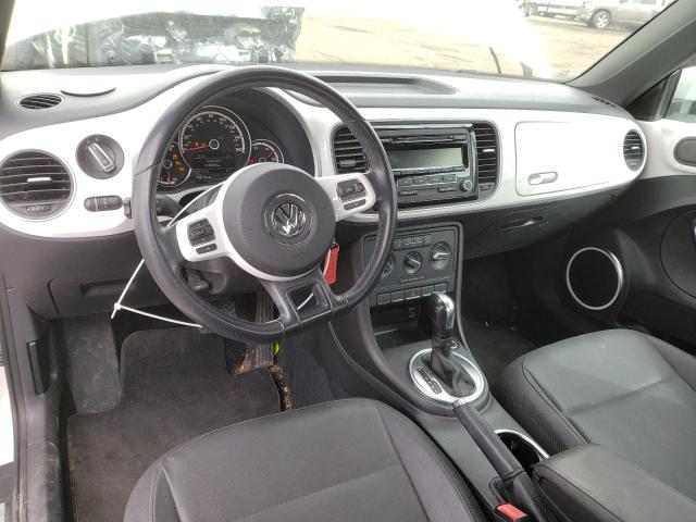 Photo 8 from auction – 2014 VOLKSWAGEN BEETLE with VIN 3VWJP7AT2EM608217