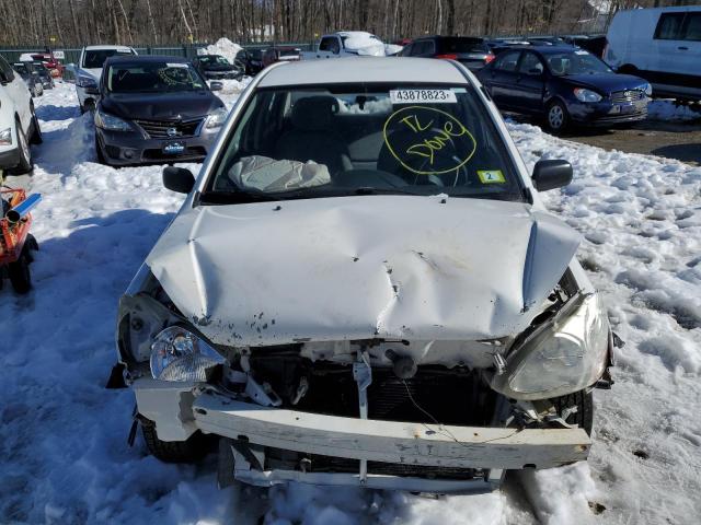 Photo 5 from auction – 2003 TOYOTA ECHO with VIN JTDBT123130290153