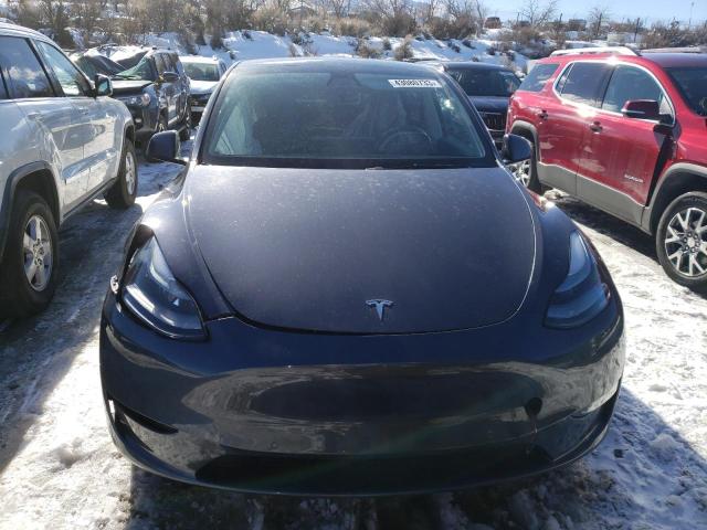 Photo 5 from auction – 2022 TESLA MODEL Y with VIN 7SAYGDEFXNF393911