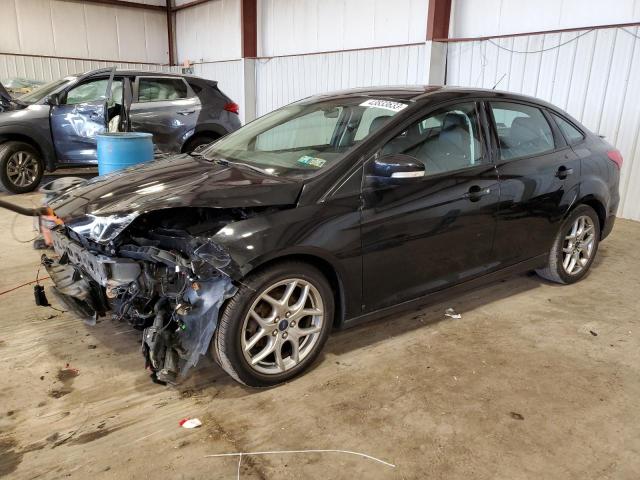 FORD FOCUS SE 2015 with VIN 1FADP3F24FL267324 - Photo from auction