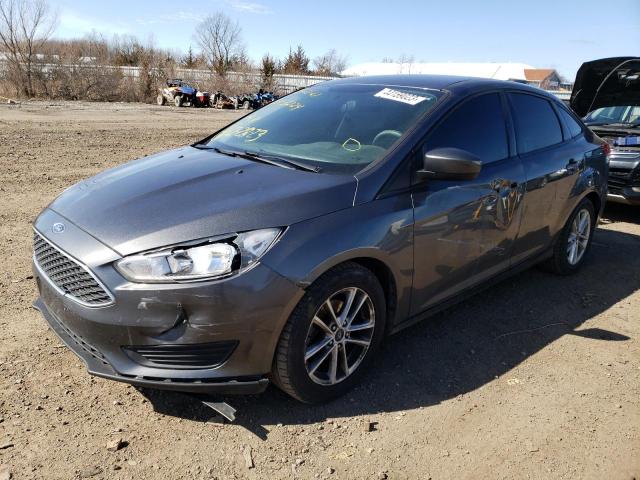 FORD FOCUS SE 2018 with VIN 1FADP3FE0JL215658 - Photo from auction
