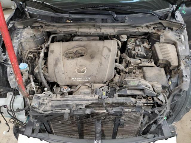 Photo 12 from auction – 2014 MAZDA CX-5 GT with VIN JM3KE4DYXE0300080