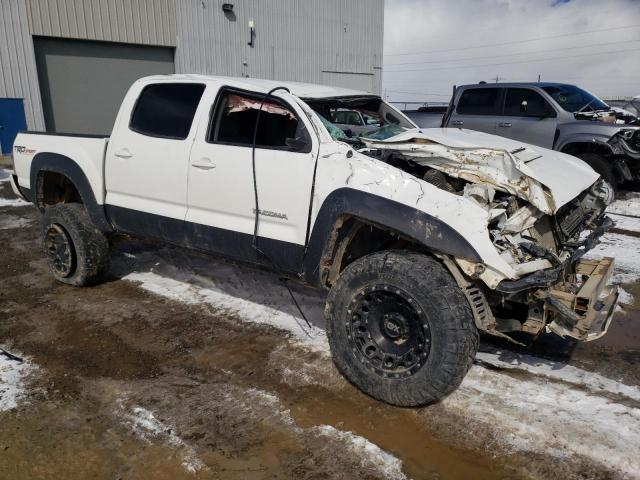 Photo 4 from auction – 2014 TOYOTA TACOMA DOU with VIN 3TMLU4EN4EM141803