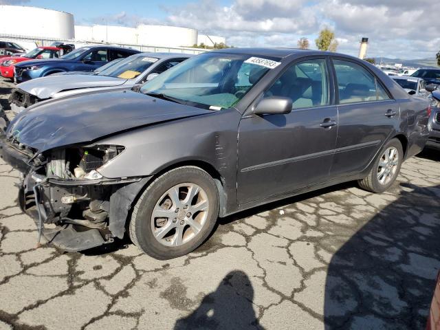 TOYOTA CAMRY LE 2005 with VIN 4T1BE30K95U974570 - Photo from auction