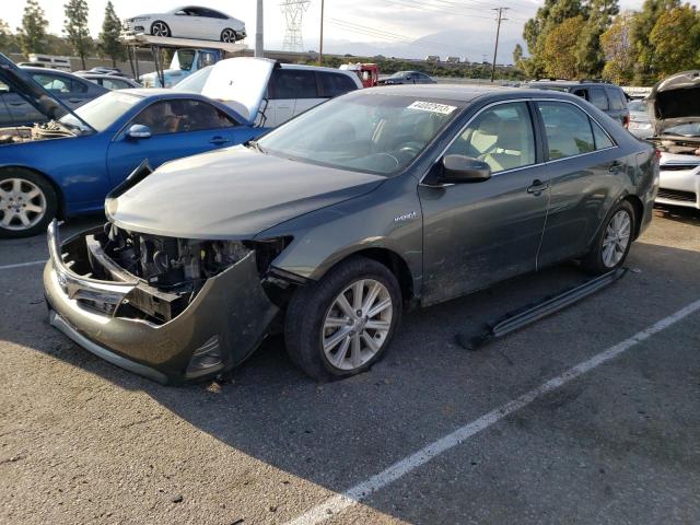 TOYOTA CAMRY HYBR 2012 with VIN 4T1BD1FK5CU057265 - Photo from auction