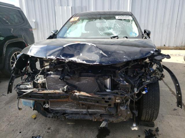 Photo 5 from auction – 2015 NISSAN ROGUE S with VIN KNMAT2MV7FP538496
