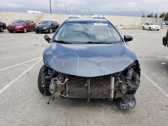 Photo 5 from auction – 2014 TOYOTA COROLLA L with VIN 5YFBURHE9EP135749