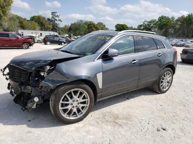 CADILLAC SRX PERFOR 2013 with VIN 3GYFNDE32DS593309 - Photo from auction