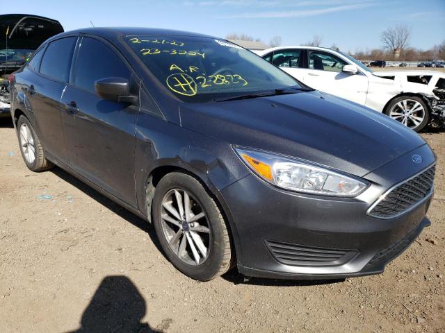 Photo 4 from auction – 2018 FORD FOCUS SE with VIN 1FADP3FE0JL215658