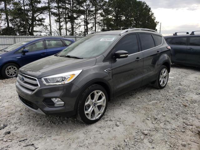 FORD ESCAPE TIT 2017 with VIN 1FMCU0J95HUC72204 - Photo from auction