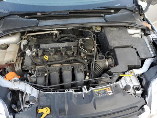 Photo 11 from auction – 2014 FORD FOCUS S with VIN 1FADP3E29EL220984