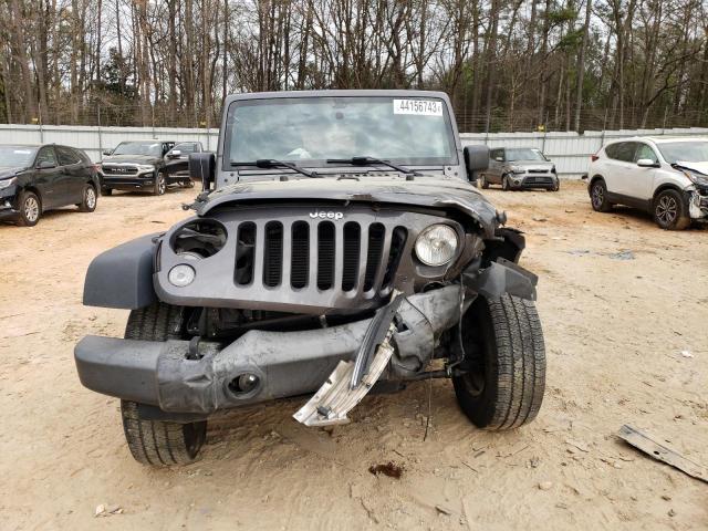 Photo 5 from auction – 2016 JEEP WRANGLER U with VIN 1C4BJWDG4GL341765
