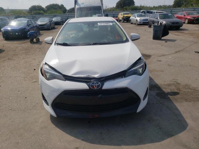 Photo 5 from auction – 2017 TOYOTA COROLLA L with VIN 5YFBURHE0HP705562