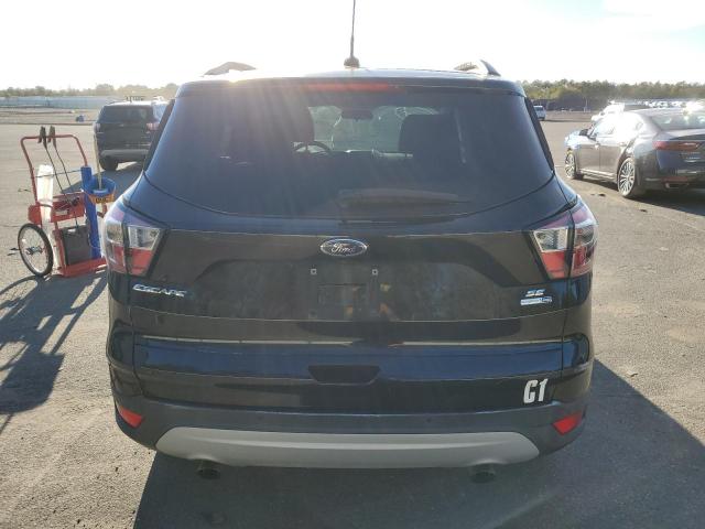 Photo 6 from auction – 2017 FORD ESCAPE SE with VIN 1FMCU9GD6HUB55540