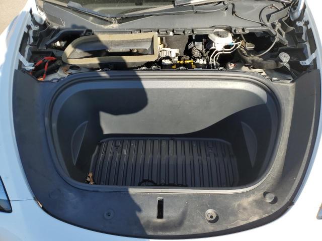 Photo 12 from auction – 2021 TESLA MODEL Y with VIN 5YJYGDEE0MF106076