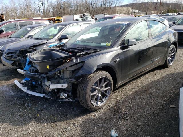 TESLA MODEL 3 2022 with VIN 5YJ3E1EB3NF267205 - Photo from auction