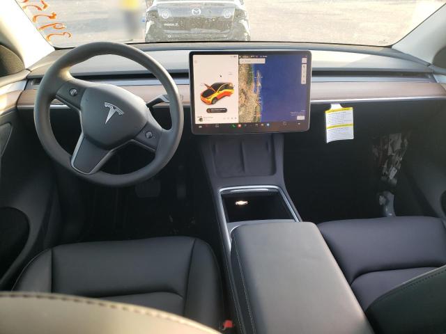 Photo 8 from auction – 2022 TESLA MODEL Y with VIN 7SAYGAEE0NF553137