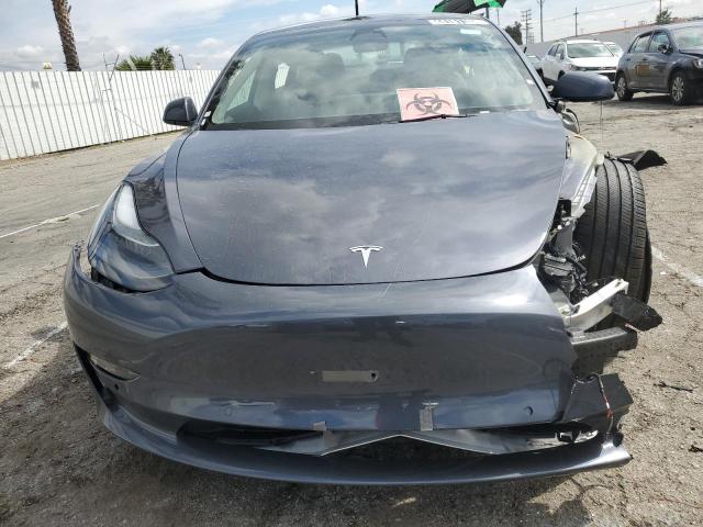 Photo 5 from auction – 2022 TESLA MODEL 3 with VIN 5YJ3E1EA3NF304325