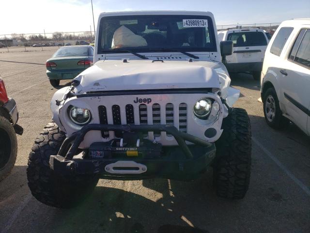Photo 5 from auction – 2012 JEEP WRANGLER U with VIN 1C4BJWDG6CL113244