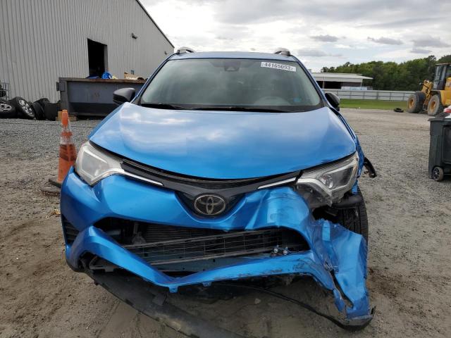 Photo 5 from auction – 2018 TOYOTA RAV4 LE with VIN JTMZFREV7JJ206118