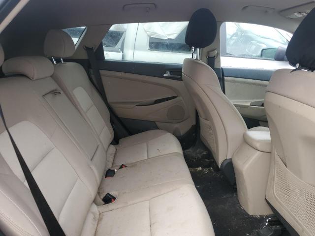 Photo 11 from auction – 2018 HYUNDAI TUCSON SE with VIN KM8J2CA48JU792289