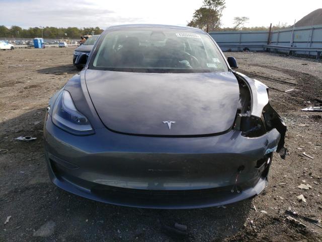 Photo 5 from auction – 2021 TESLA MODEL 3 with VIN 5YJ3E1EA7MF052853