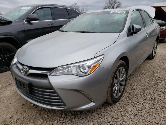 TOYOTA CAMRY LE 2015 with VIN 4T1BF1FK6FU973872 - Photo from auction