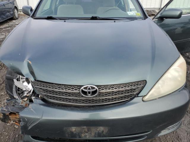Photo 11 from auction – 2004 TOYOTA CAMRY LE with VIN 4T1BF32K84U075515