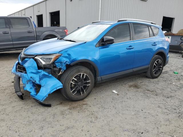 TOYOTA RAV4 LE 2018 with VIN JTMZFREV7JJ206118 - Photo from auction