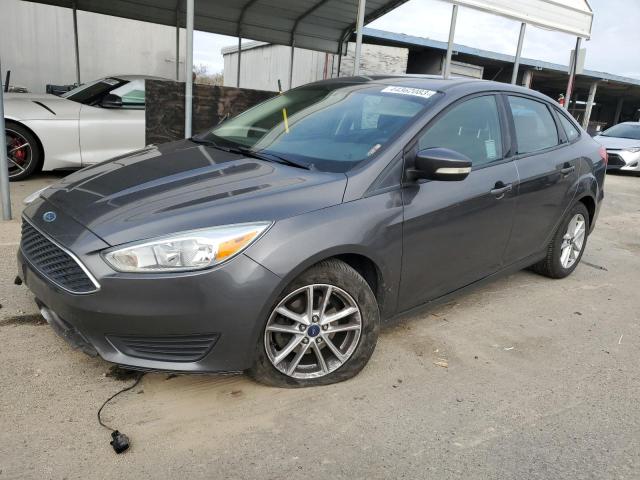 FORD FOCUS SE 2015 with VIN 1FADP3F27FL207098 - Photo from auction