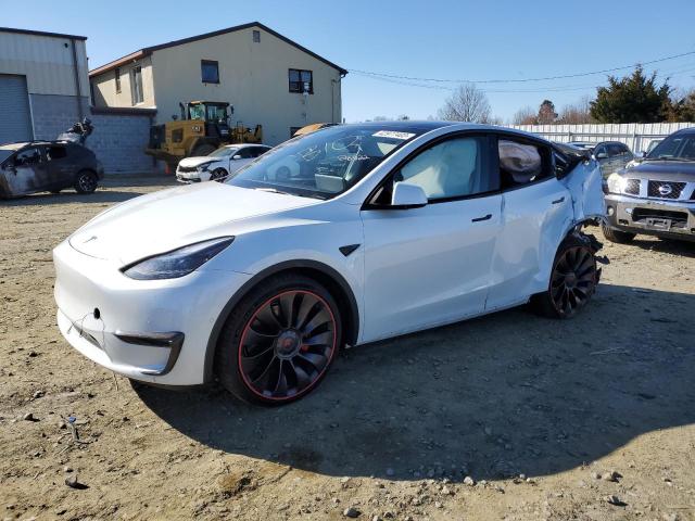 TESLA MODEL Y 2022 with VIN 7SAYGDEF3NF521471 - Photo from auction