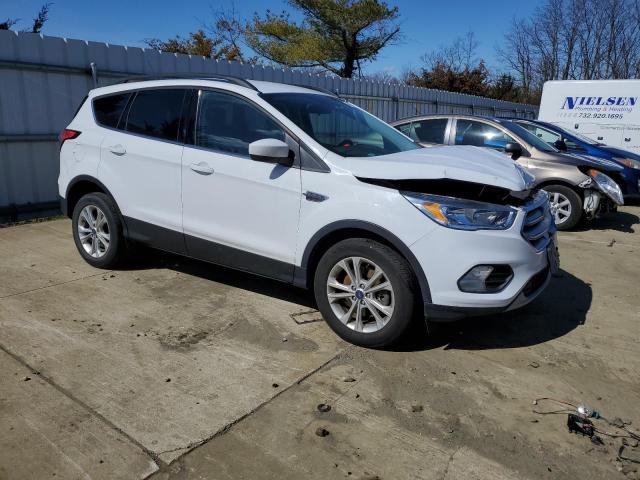 Photo 4 from auction – 2018 FORD ESCAPE SE with VIN 1FMCU9GD1JUB93571