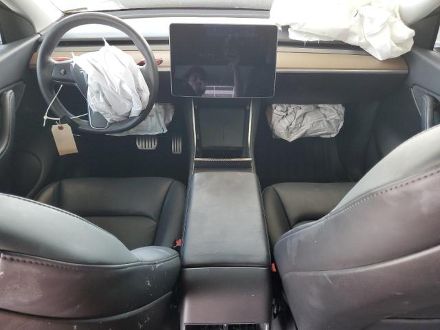Photo 8 from auction – 2021 TESLA MODEL Y with VIN 5YJYGDED6MF110317
