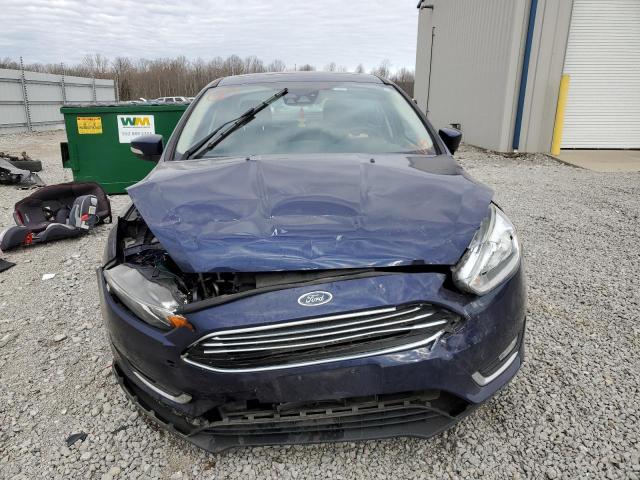 Photo 5 from auction – 2017 FORD FOCUS TITA with VIN 1FADP3J28HL302859