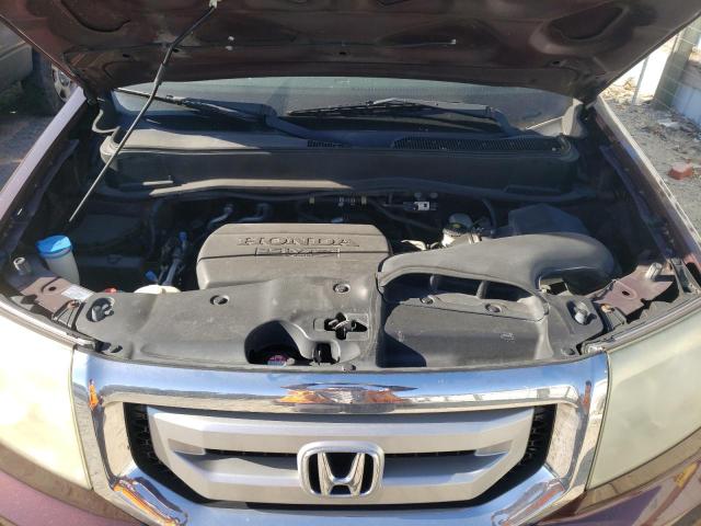 Photo 12 from auction – 2011 HONDA PILOT TOUR with VIN 5FNYF4H9XBB050940