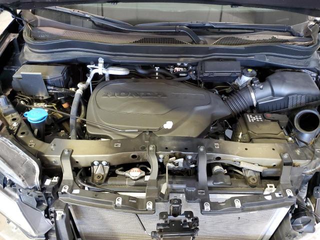 Photo 12 from auction – 2021 HONDA PASSPORT E with VIN 5FNYF8H03MB023087