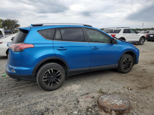 Photo 3 from auction – 2018 TOYOTA RAV4 LE with VIN JTMZFREV7JJ206118