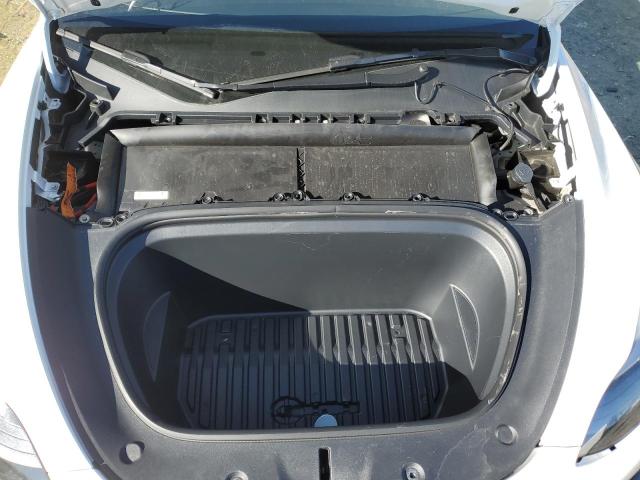 Photo 12 from auction – 2022 TESLA MODEL Y with VIN 7SAYGDEF3NF521471