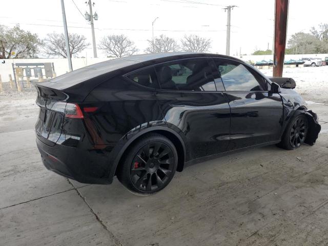Photo 3 from auction – 2021 TESLA MODEL Y with VIN 5YJYGDED6MF110317