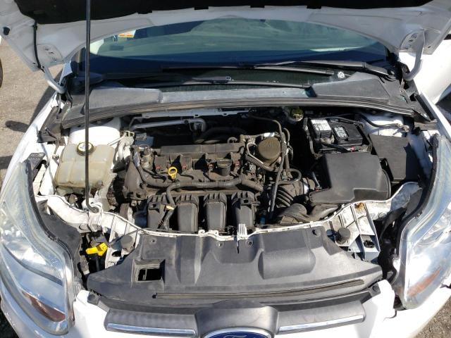 Photo 11 from auction – 2013 FORD FOCUS SE with VIN 1FADP3F22DL337982