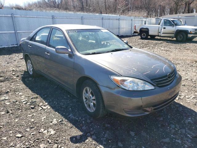 Photo 4 from auction – 2004 TOYOTA CAMRY LE with VIN JTDBE32K240269181