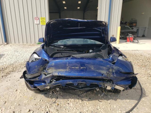 Photo 5 from auction – 2022 TESLA MODEL 3 with VIN 5YJ3E1EB9NF287538
