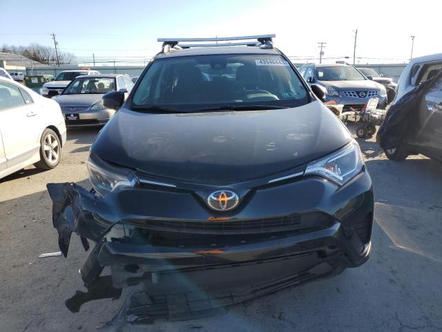 Photo 5 from auction – 2017 TOYOTA RAV4 LE with VIN 2T3BFREV4HW556707