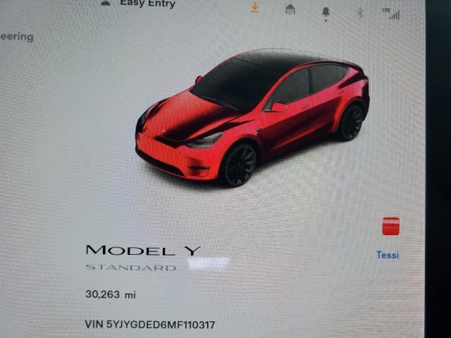 Photo 9 from auction – 2021 TESLA MODEL Y with VIN 5YJYGDED6MF110317