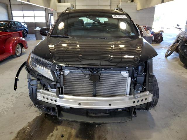 Photo 5 from auction – 2021 HONDA PASSPORT E with VIN 5FNYF8H03MB023087