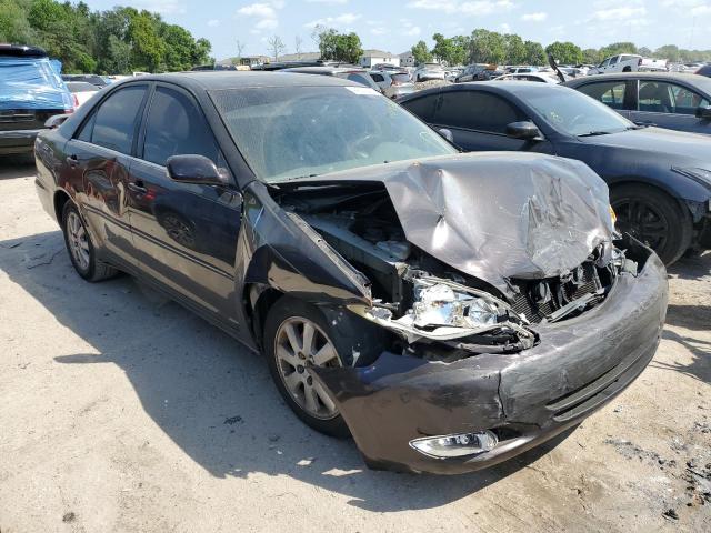 Photo 4 from auction – 2004 TOYOTA CAMRY LE with VIN 4T1BF30K74U572509
