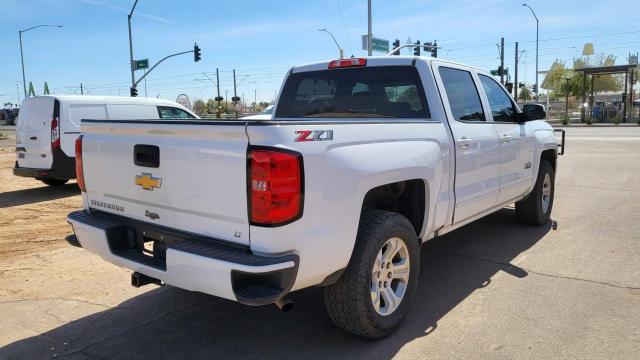 Photo 4 from auction – 2018 CHEVROLET SILVERADO with VIN 3GCUKREC6JG444113
